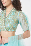 Stylised blouse with dreamy fin sleeve teamed with tiered lehenga and mesh dupatta Closeview