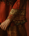 RUST IKAT PEPLUM KURTA SET WITH ANTIQUE GOLD SHARARA
