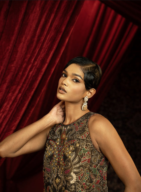 BLACK VINTAGE METAL EMBROIDERED A- LINE SHIFT DRESS WITH JALI HEMLINE & MULTICOLOUR POM-POMS