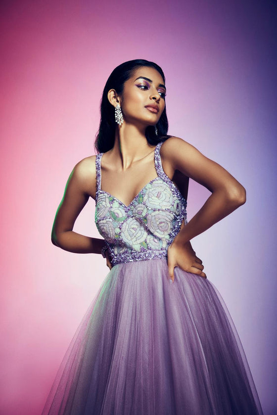 Net ball gown with pastel color mesh and sequine embroidery